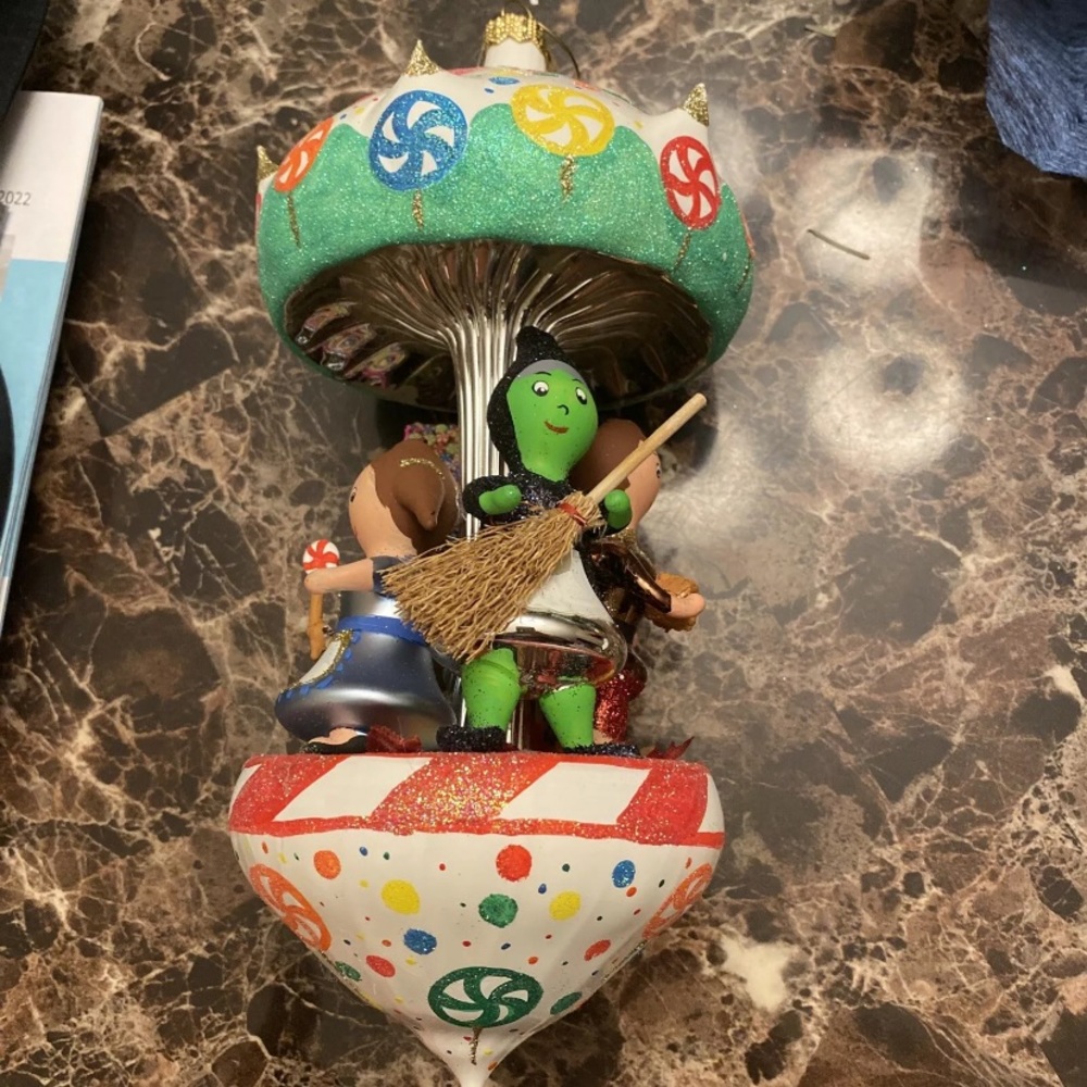 Hansel And Greta’s Carousel blown glass christmas ornament.